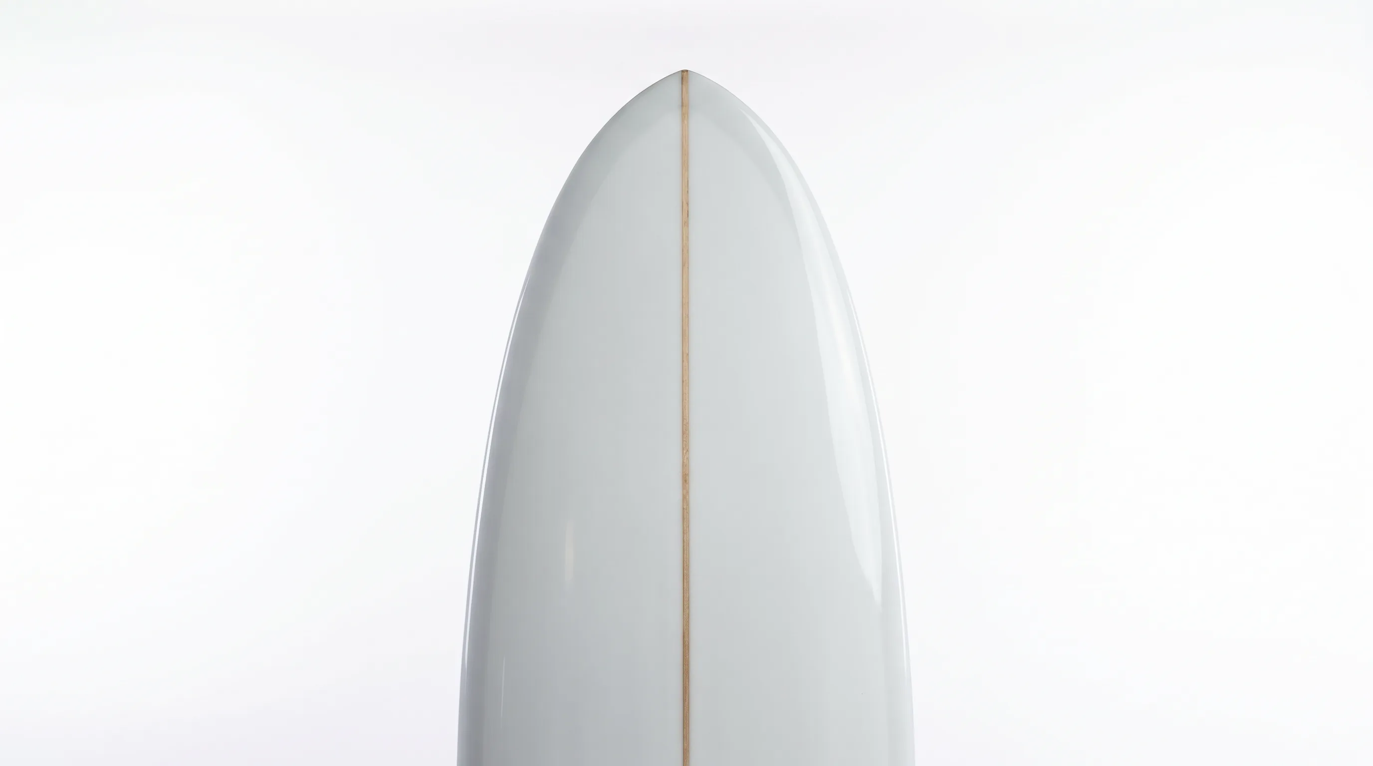 Grom surfboard with brand stickers